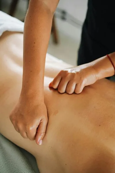 Four hand massage by two therapists